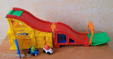 Zjeżdżalnia domek z garażem Fisher-Price