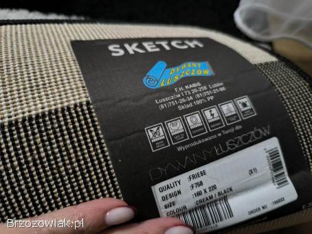 Sprzedam dywan w pasy bialo-czarne