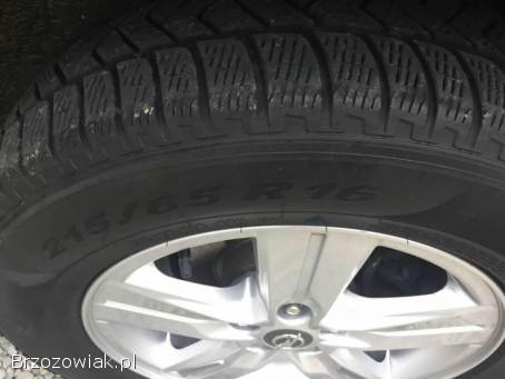 Sprzedam oryginalne alufelgi opel z oponami zimowymi