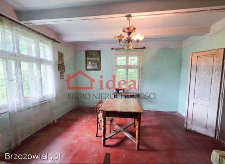 Mały,  drewniany dom w centrum Brzozowa