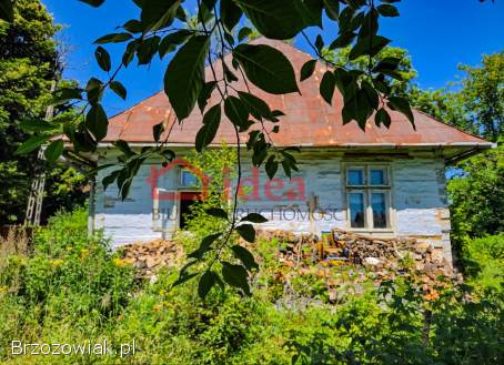 Mały,  drewniany dom w centrum Brzozowa