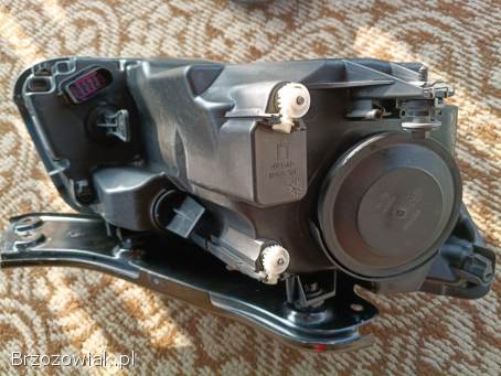 Lampa Reflektor VW Caddy